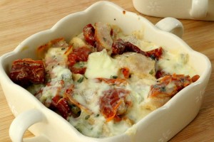 Gratin de quenelles de volaille aux tomates séchées et gorgonzola