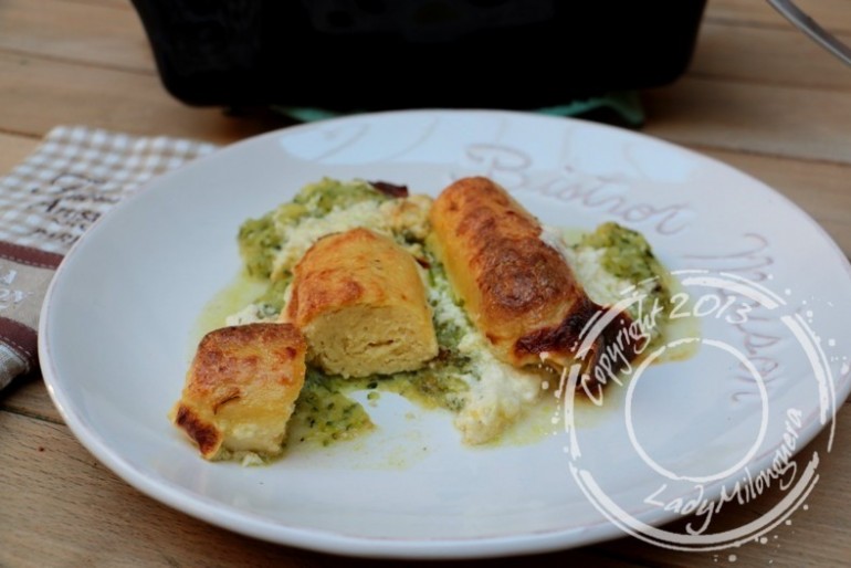 Gratin de quenelles de brochet sur lit de courgettes et crème de parmesan